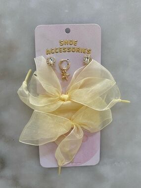 Anthropologie shoe charm and laces set yellow